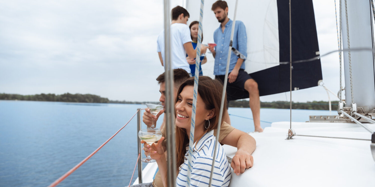 group-happy-friends-drinking-vodka-cocktails-boat-party-outdoor-summer